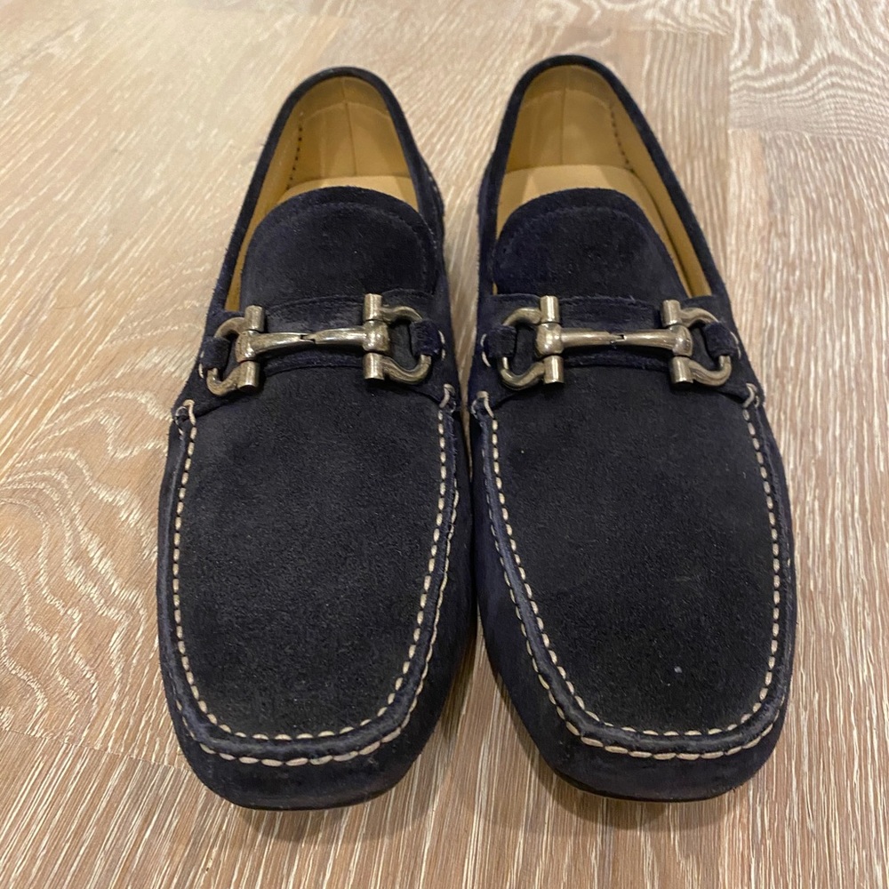 Men’s Ferragamo navy shoes.